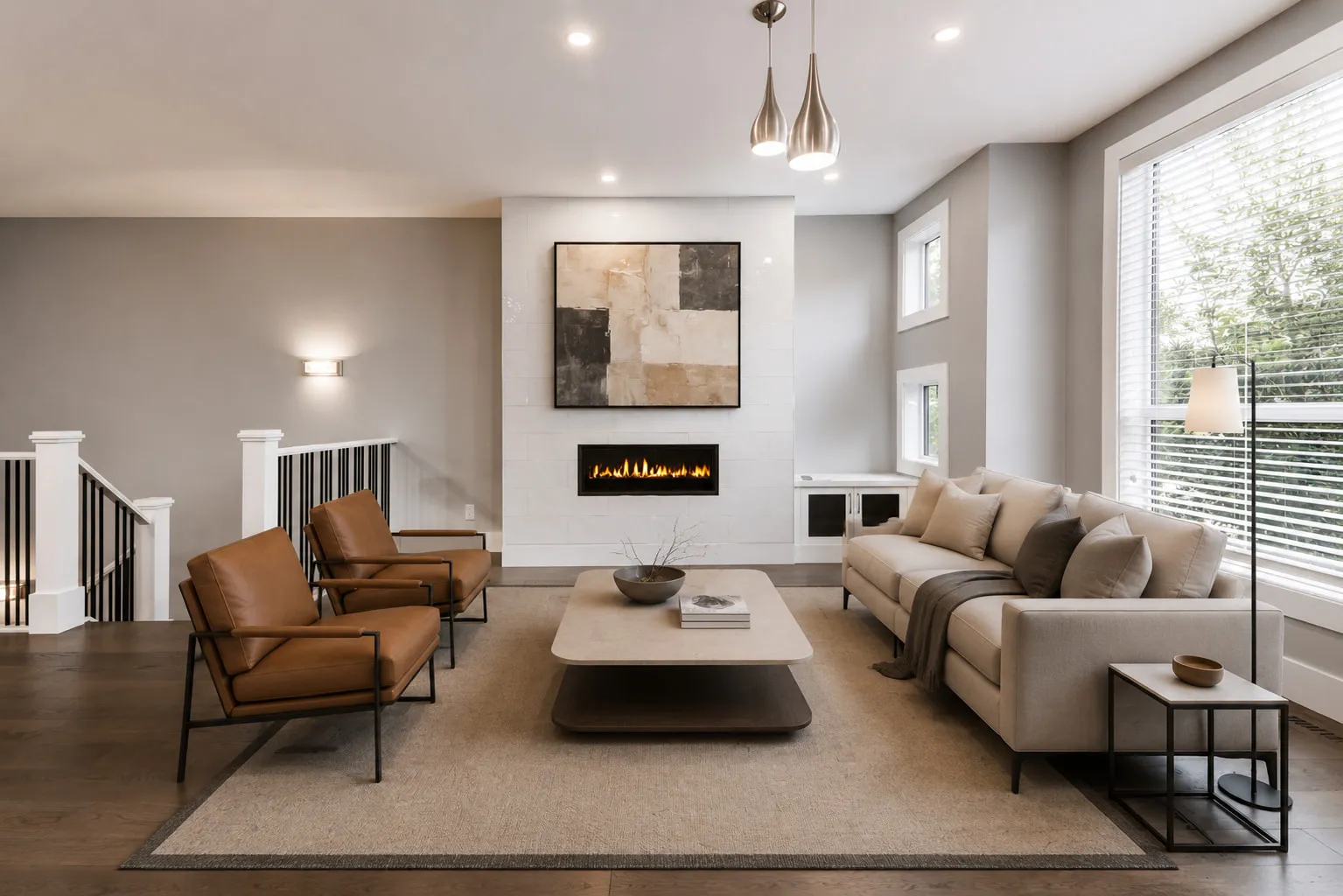 A living room with a linear fireplace in a Calgary rental property managed by NEXA